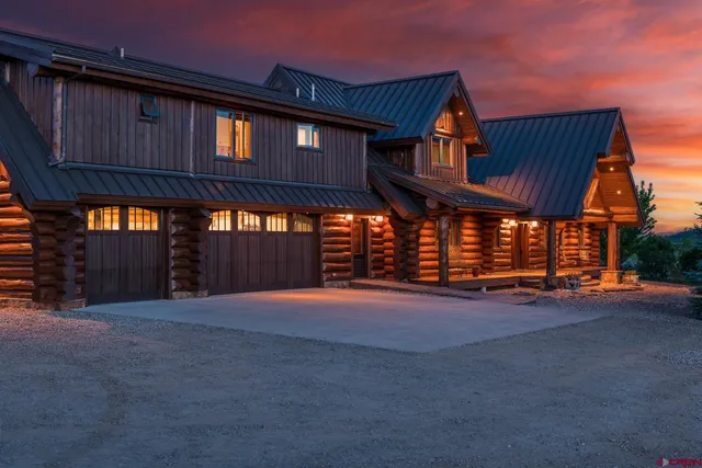 a view of a house with a street