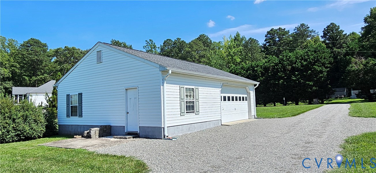 617 Sheepside Road Laneview, VA 22504 - Photo 7 of 9 Detached auxiliary building with white siding, a s