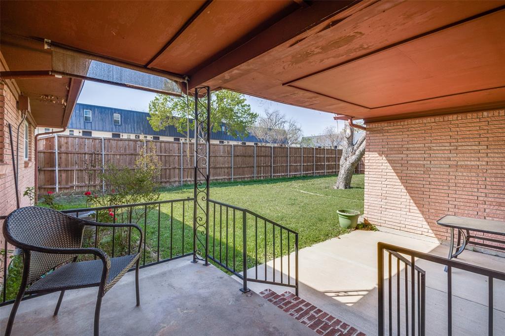 433 Fulton Street Denton, TX 76201 - Photo 22 of 25 a view of a backyard with a garden and plants