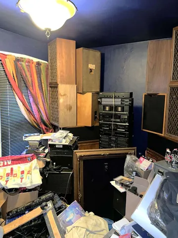 a room with furniture and a flat screen tv