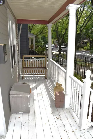 a view of a two chairs in the porch