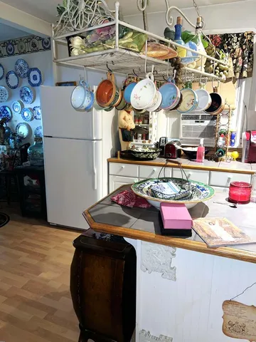 a kitchen with lots of counter top space and stove top oven