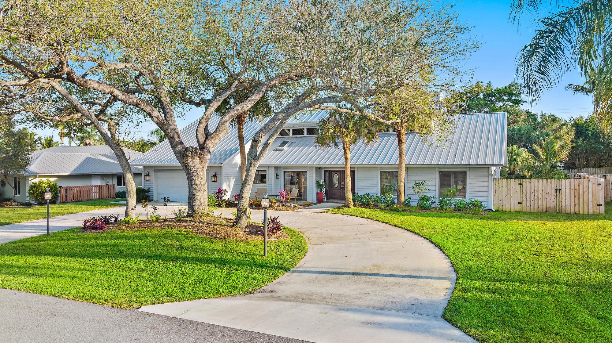 8422 Southeast Quail Ridge Way Hobe Sound, FL 33455 - Photo 2 of 42 Front of Home