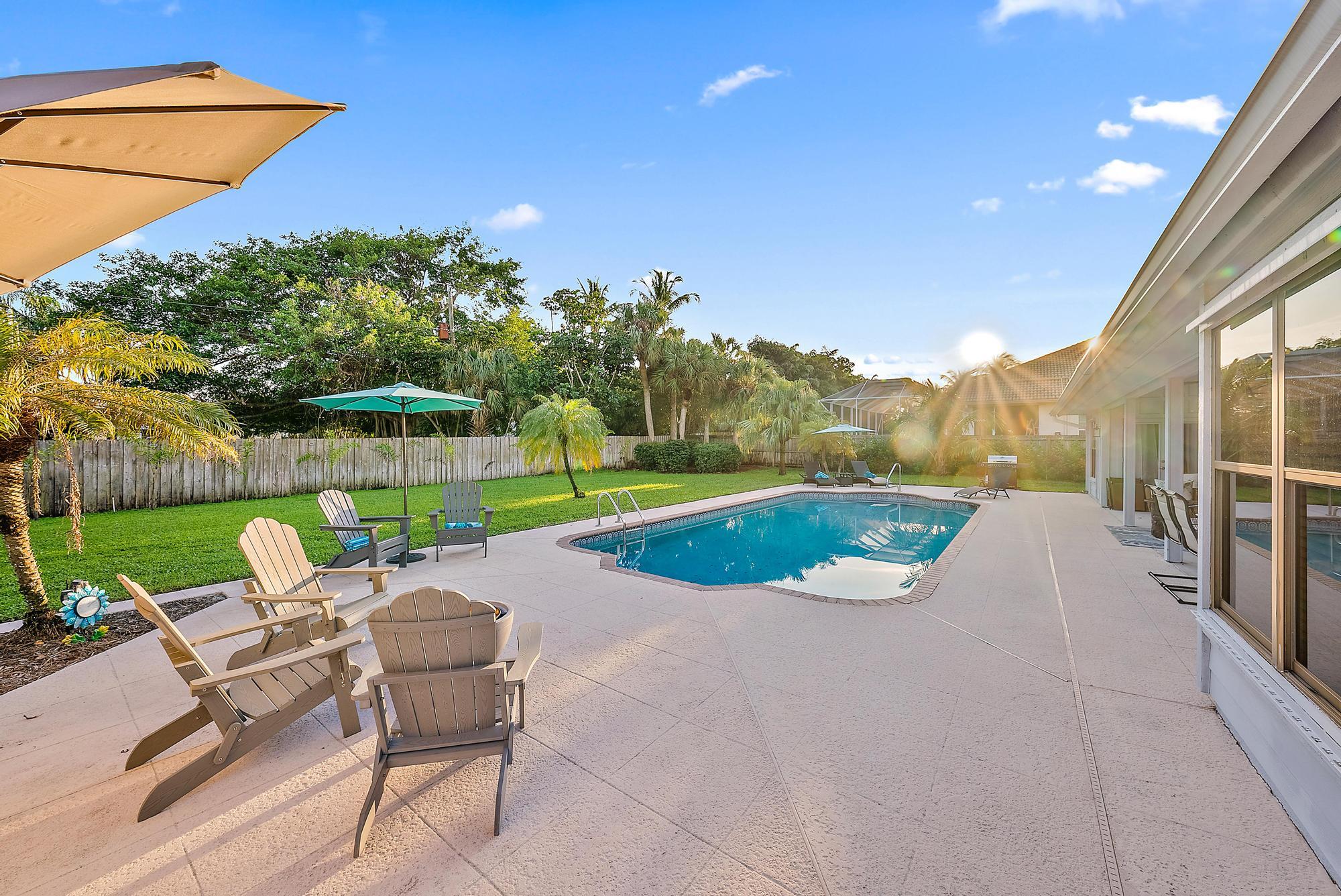 8422 Southeast Quail Ridge Way Hobe Sound, FL 33455 - Photo 24 of 42 Pool Patio West Side