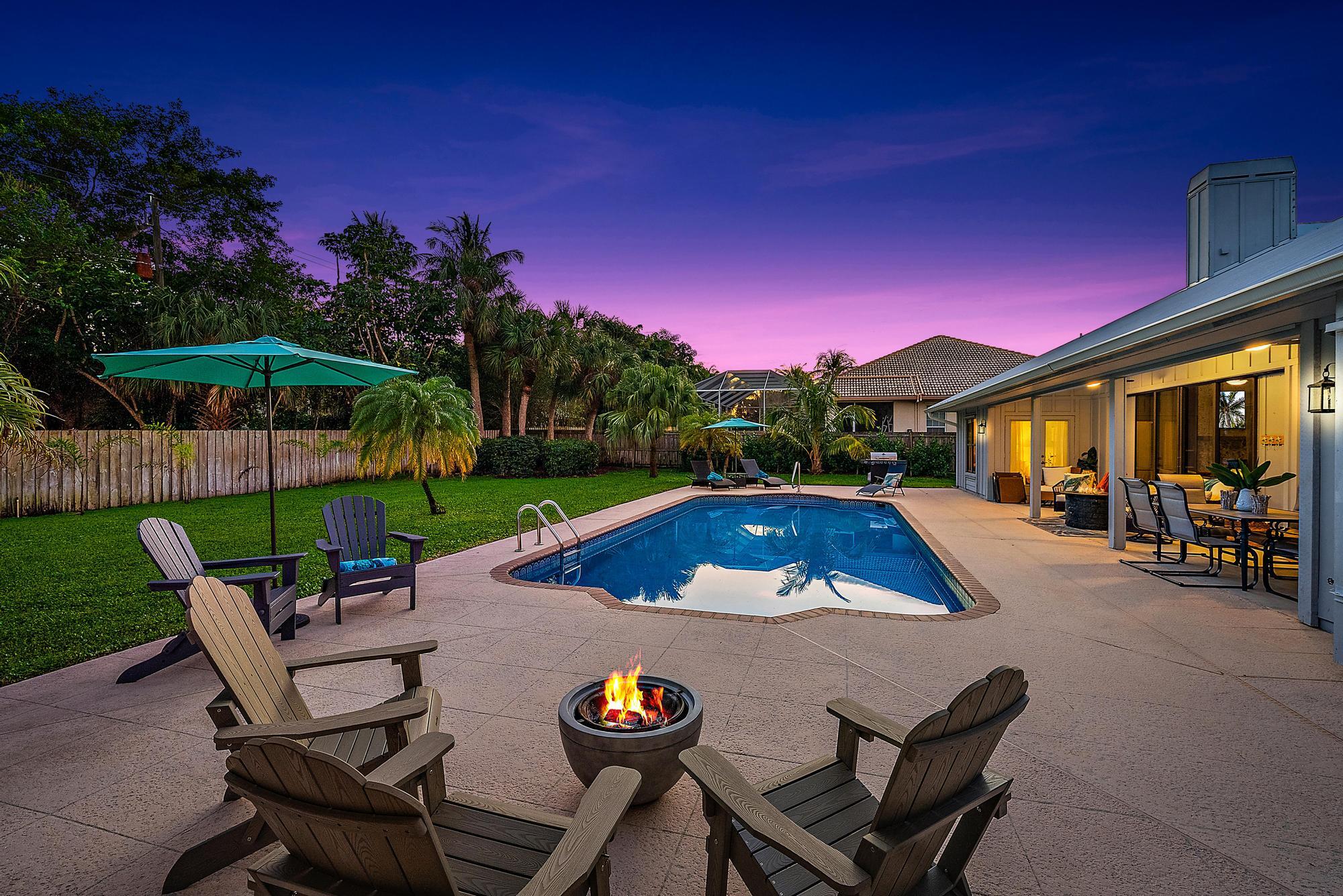 8422 Southeast Quail Ridge Way Hobe Sound, FL 33455 - Photo 30 of 42 Pool Patio Night