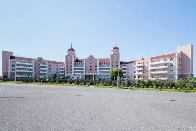 a view of a building with outdoor seating