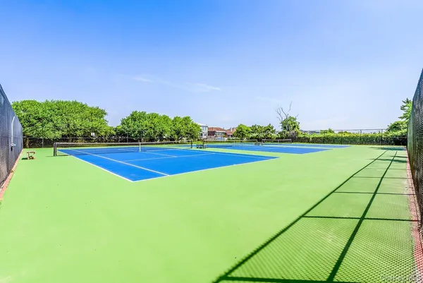 a view of a big yard with an outdoor space
