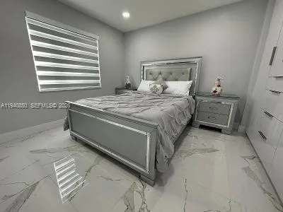 a utility room with washer and dryer