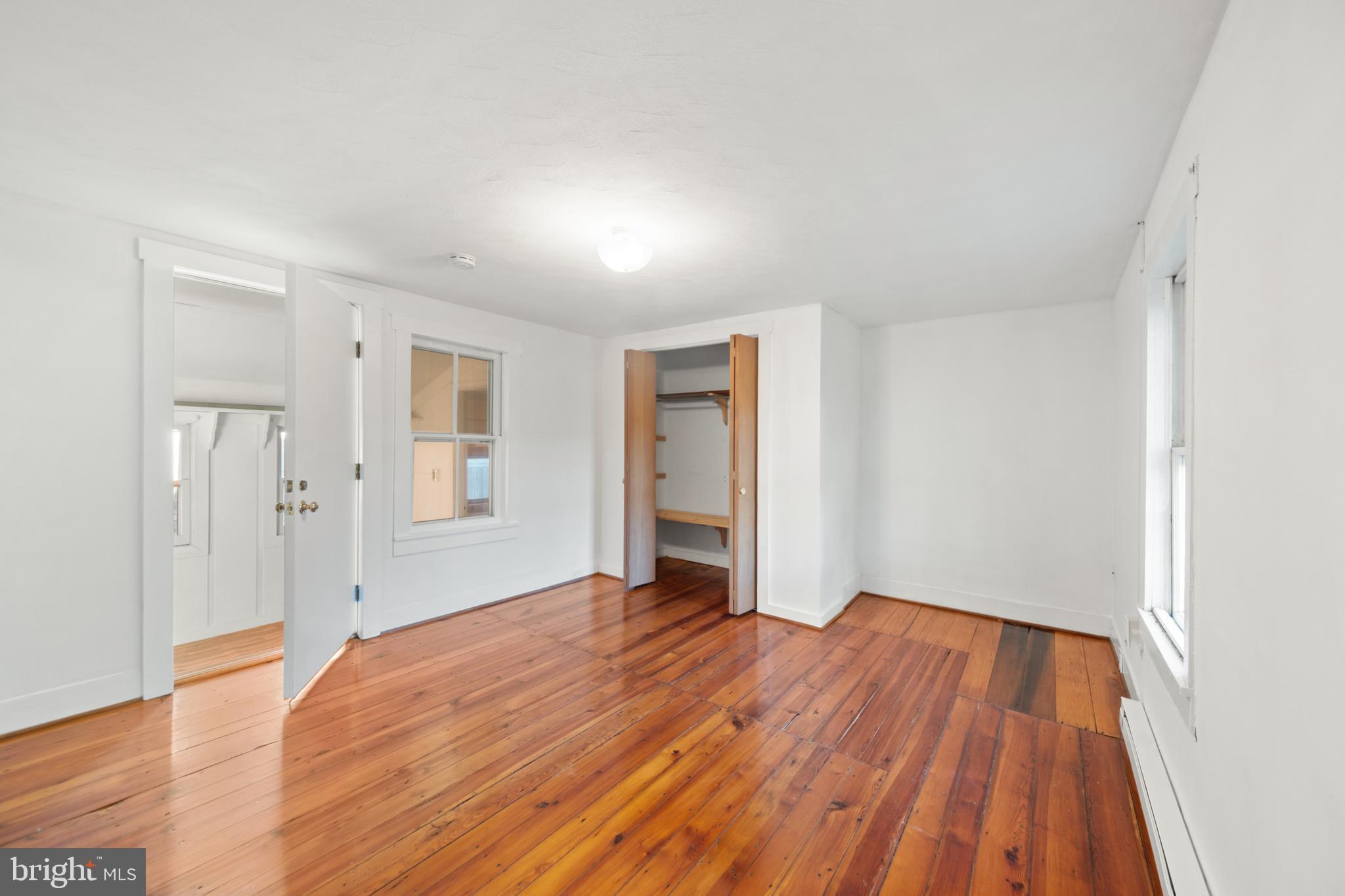 290 Howards Chapel Road Winchester, VA 22603 - Photo 23 of 33 a view of a room with wooden floor and a window