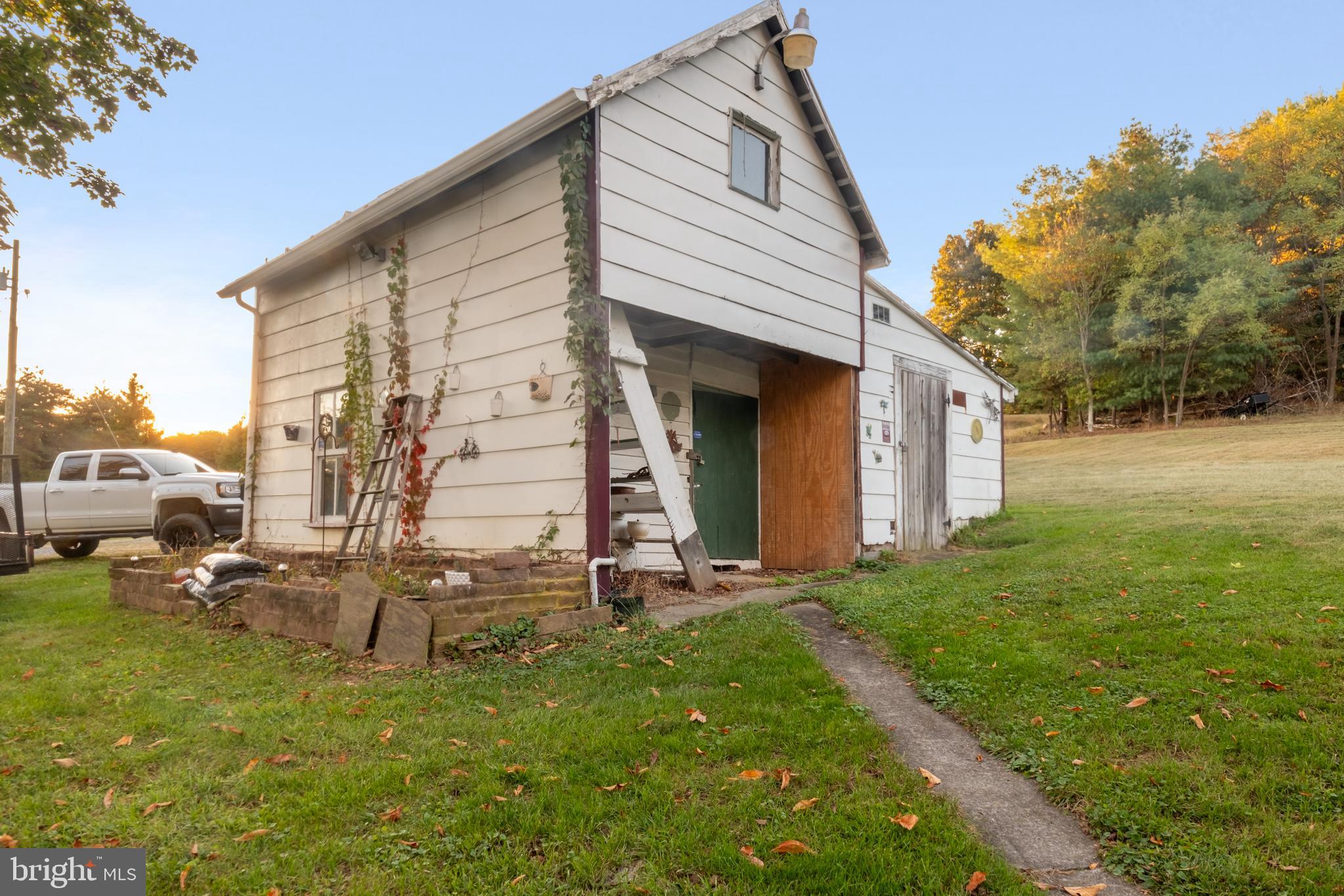 290 Howards Chapel Road Winchester, VA 22603 - Photo 33 of 33 a view of backyard of house and car parked