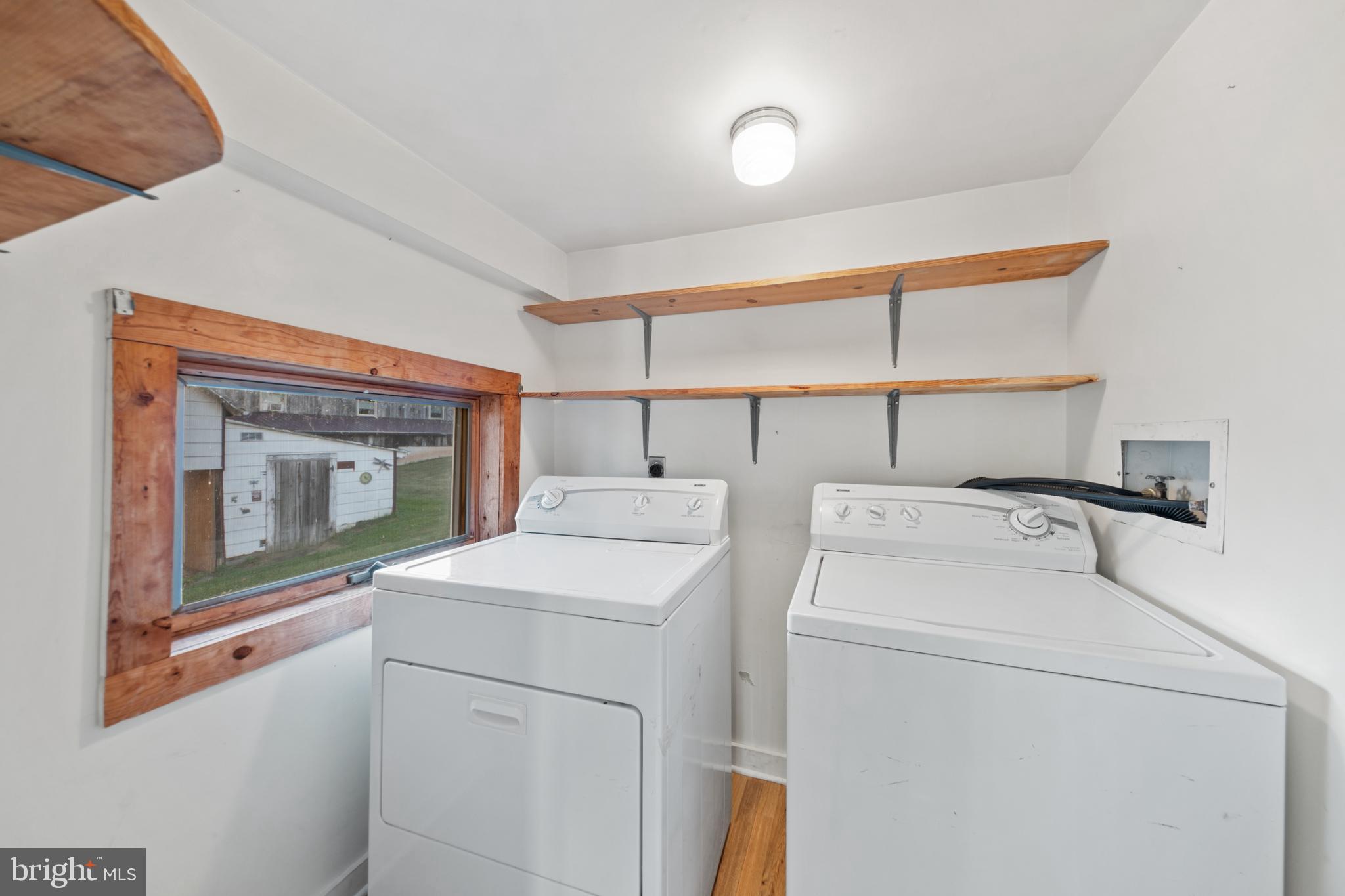 290 Howards Chapel Road Winchester, VA 22603 - Photo 9 of 33 a utility room with dryer and washer
