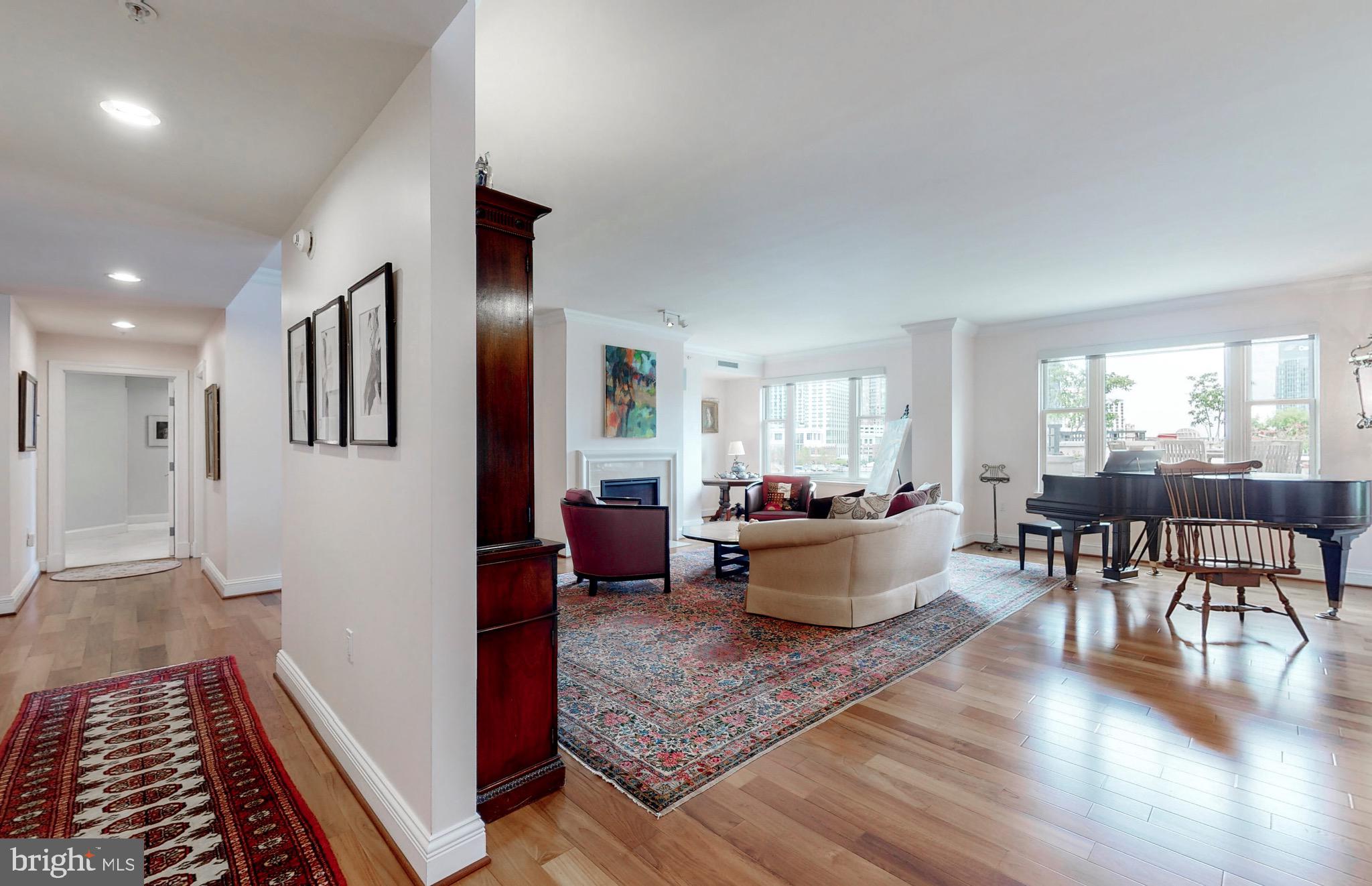 801 Key Highway, Unit T11 Baltimore, MD 21230 - Photo 17 of 86 a living room with furniture and a wooden floor