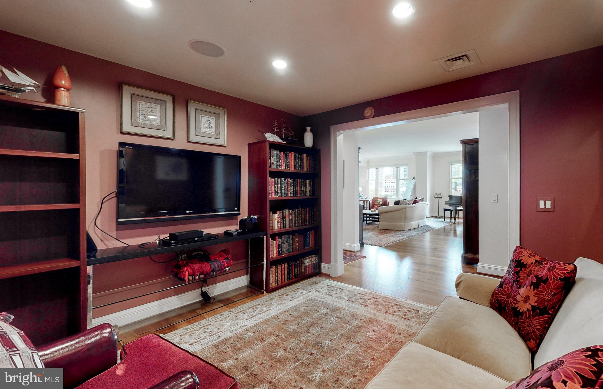 801 Key Highway, Unit T11 Baltimore, MD 21230 - Photo 18 of 86 a living room with furniture and a flat screen tv
