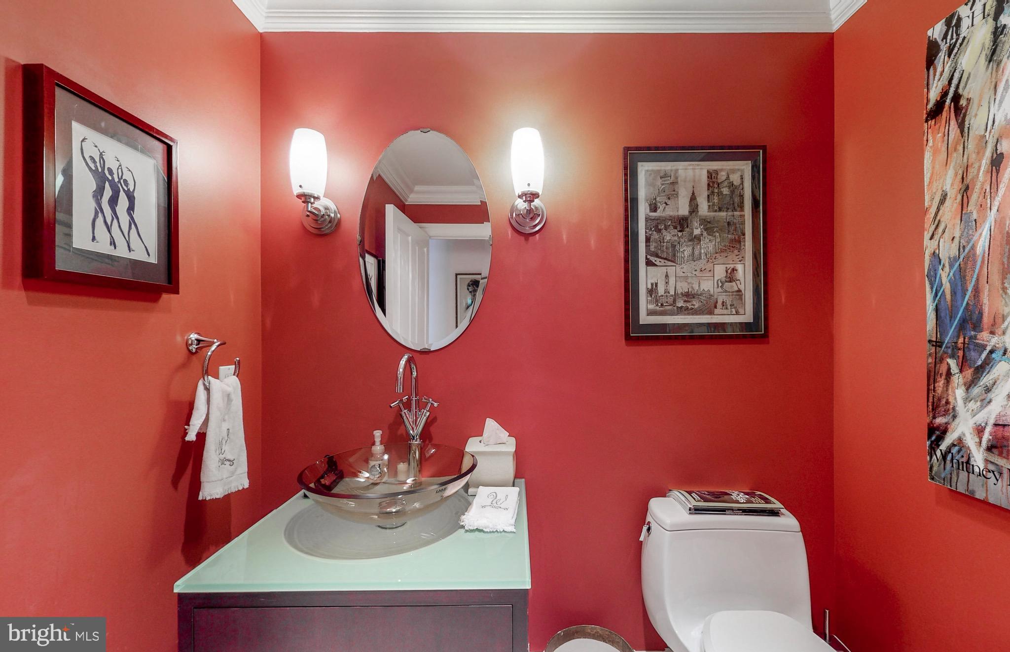 801 Key Highway, Unit T11 Baltimore, MD 21230 - Photo 19 of 86 a bathroom with a toilet sink and mirror