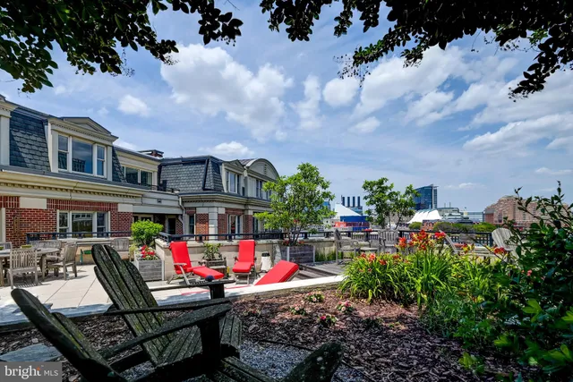 a outdoor space with patio furniture and a potted plant