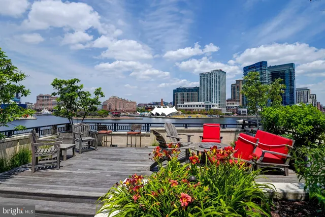 a outdoor space with lots of tables and chairs