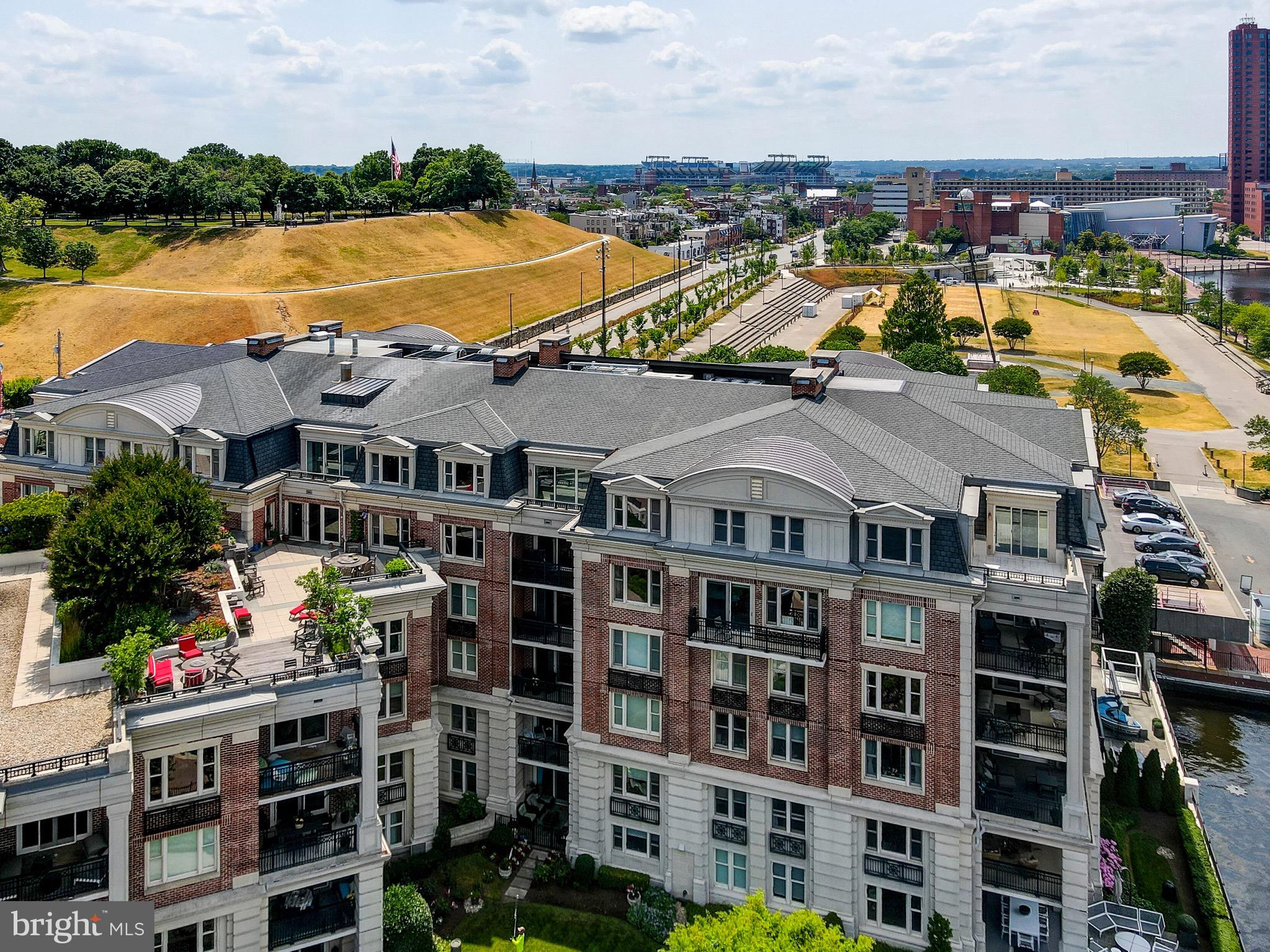 801 Key Highway, Unit T11 Baltimore, MD 21230 - Photo 45 of 86 a view of a lake with building in front of it
