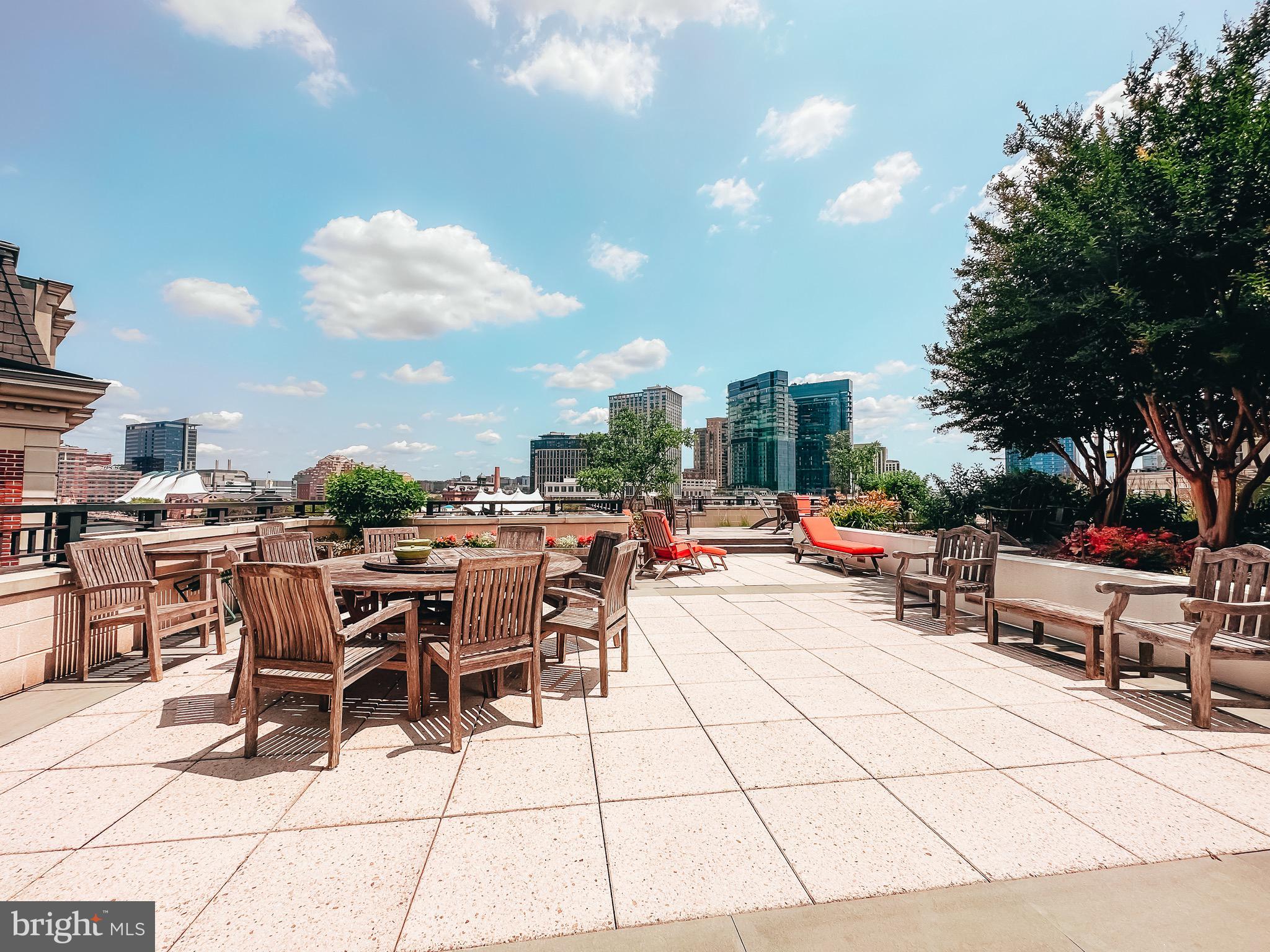 801 Key Highway, Unit T11 Baltimore, MD 21230 - Photo 57 of 86 a view of a terrace with furniture and garden