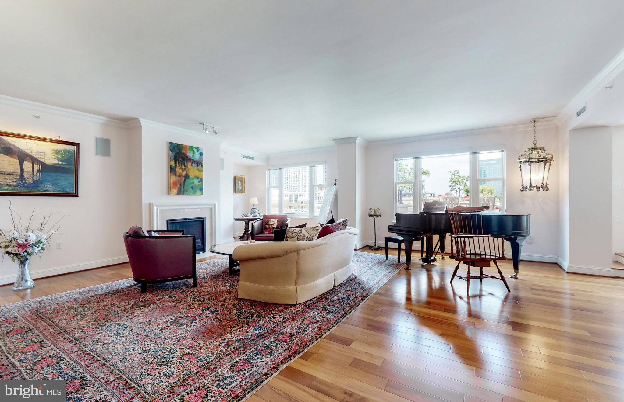 801 Key Highway, Unit T11 Baltimore, MD 21230 - Photo 6 of 86 a living room with furniture and wooden floor