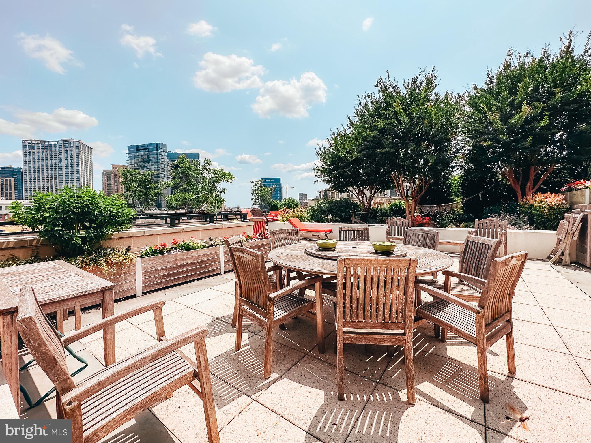 801 Key Highway, Unit T11 Baltimore, MD 21230 - Photo 65 of 86 a view of a patio with a table and chairs