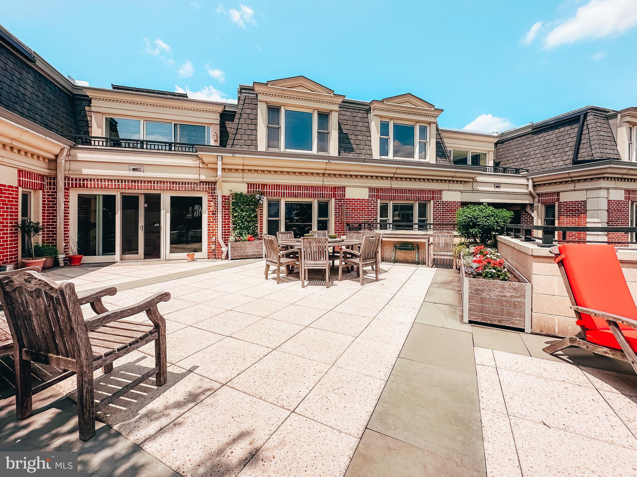 801 Key Highway, Unit T11 Baltimore, MD 21230 - Photo 66 of 86 a view of a patio with dining table and chairs