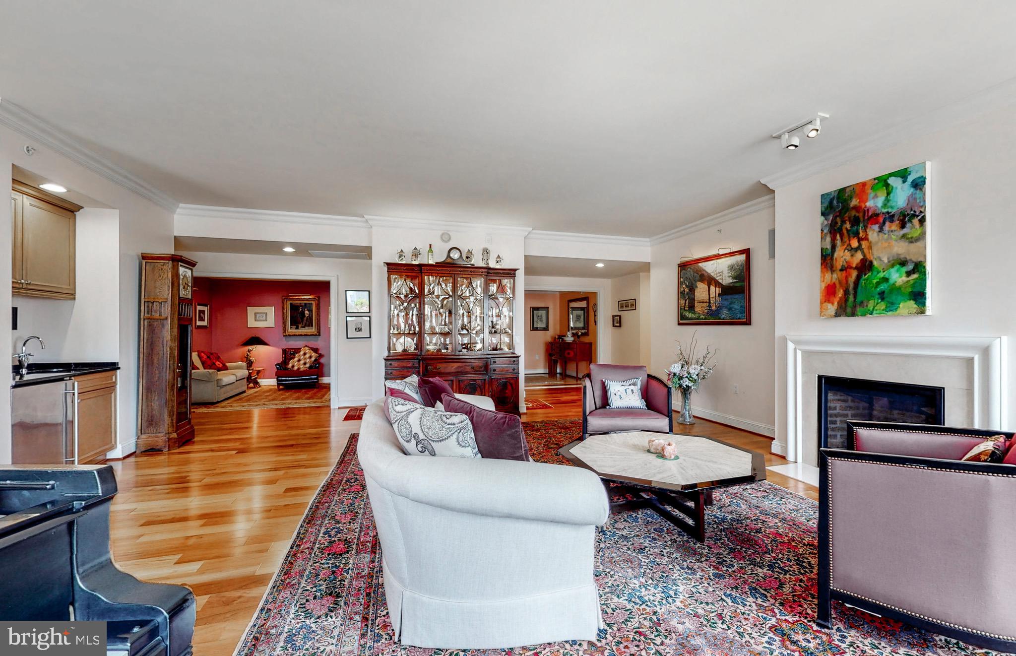 801 Key Highway, Unit T11 Baltimore, MD 21230 - Photo 7 of 86 a living room with furniture a rug and a fireplace
