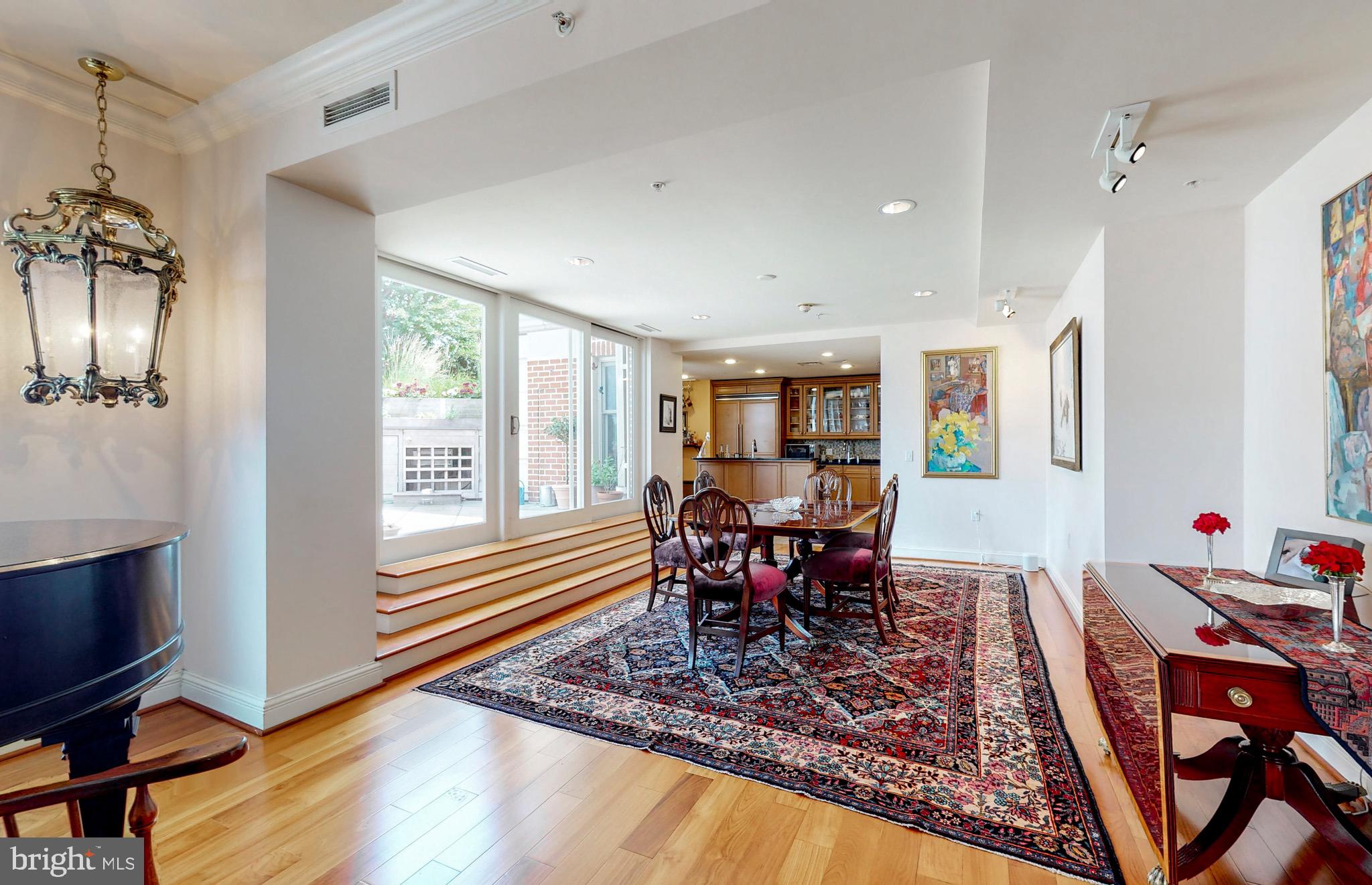 801 Key Highway, Unit T11 Baltimore, MD 21230 - Photo 8 of 86 a view of a dining room with furniture window and wooden floor