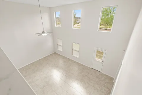 an empty room with windows