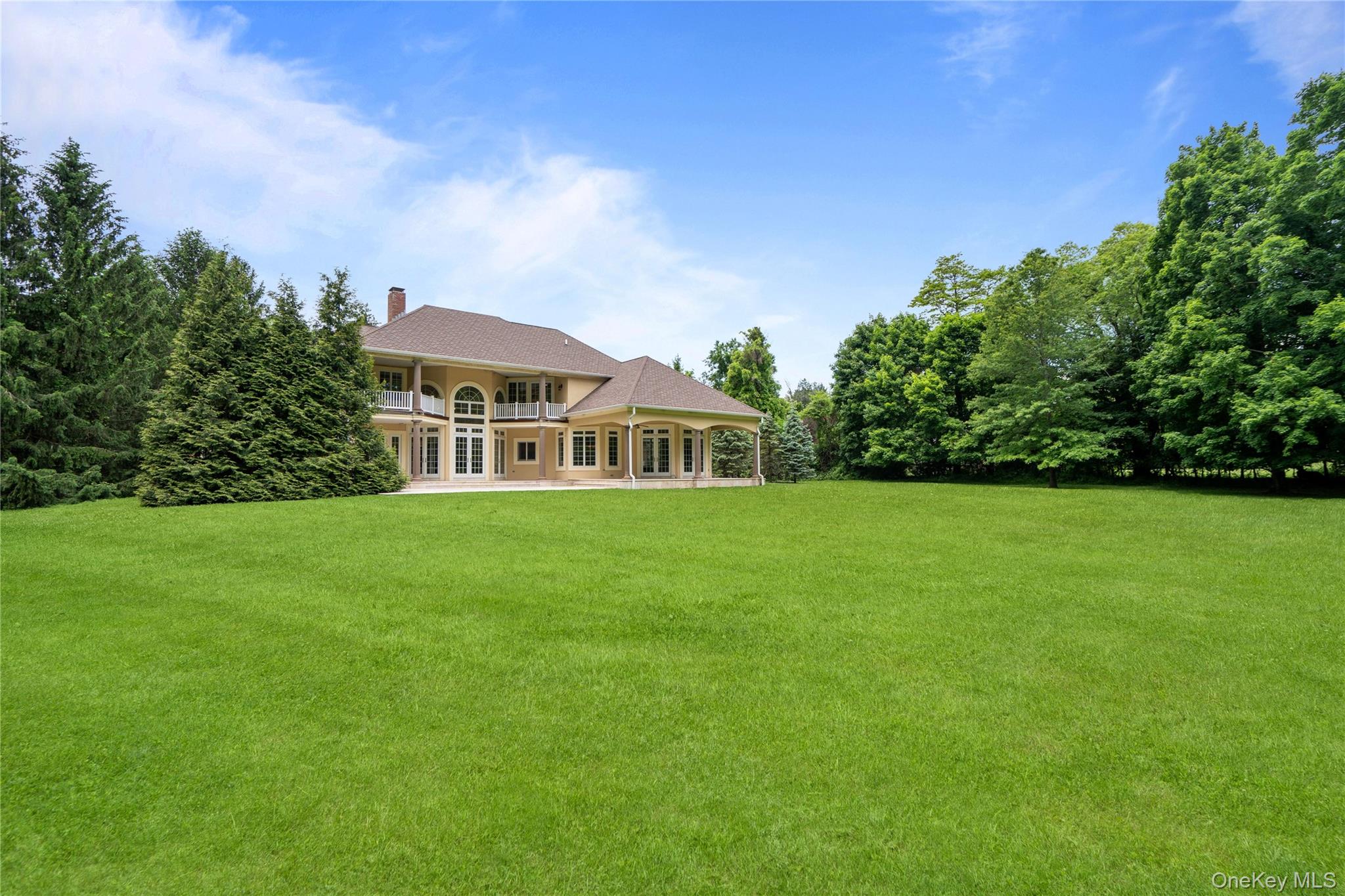 1960 Midlane Road South Syosset, NY 11791 - Photo 46 of 46 a front view of a house with garden