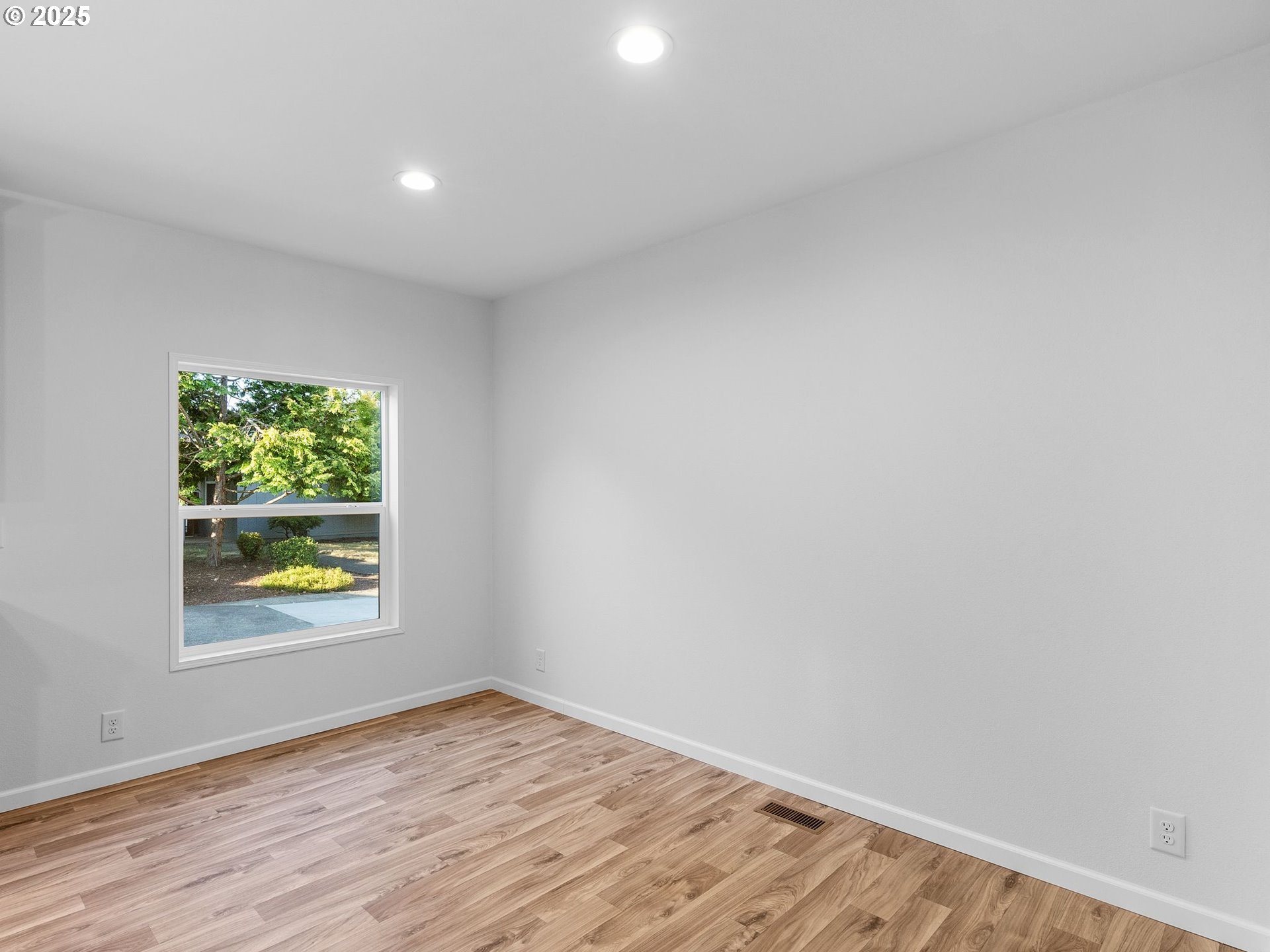 12904 Southeast Ramona Street Portland, OR 97236 - Photo 14 of 35 a view of an empty room and window