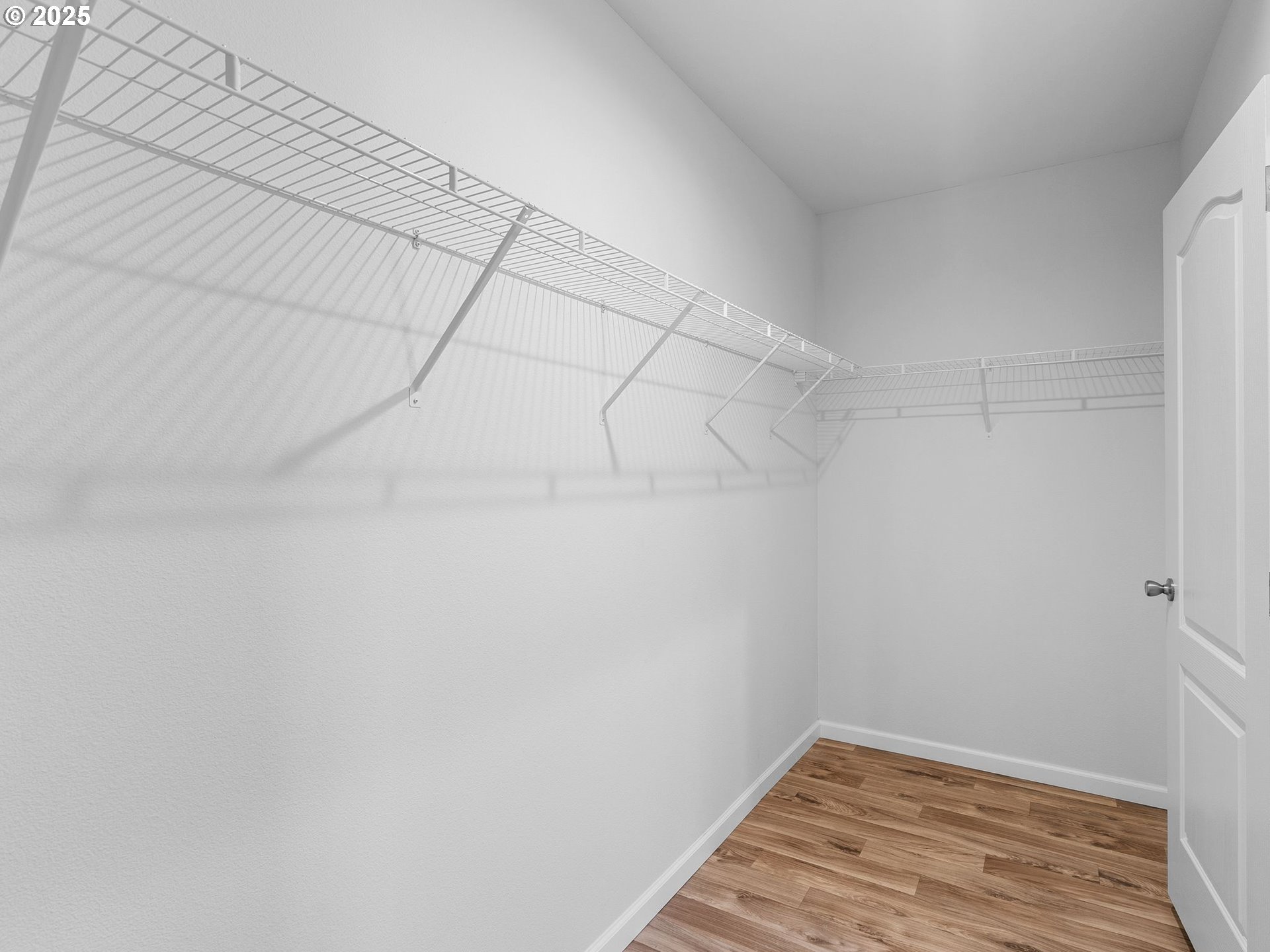 12904 Southeast Ramona Street Portland, OR 97236 - Photo 20 of 35 a view of a room with wooden floor