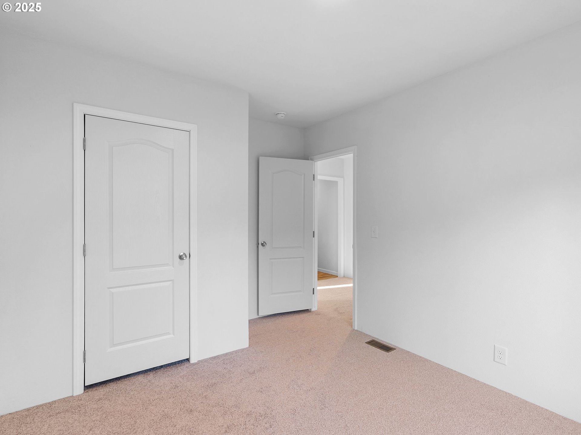 12904 Southeast Ramona Street Portland, OR 97236 - Photo 24 of 35 a view of an empty room and closet area