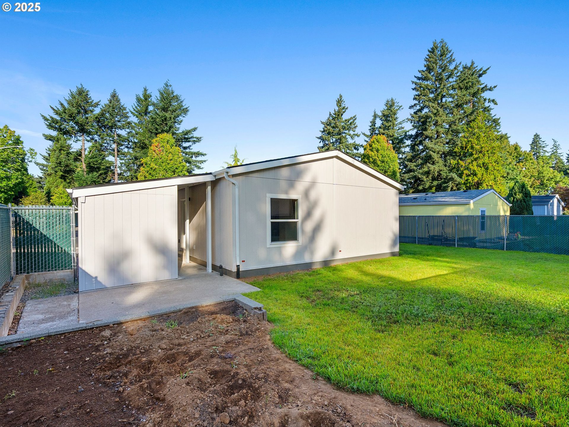 12904 Southeast Ramona Street Portland, OR 97236 - Photo 33 of 35 a view of backyard with a garden and entertaining space