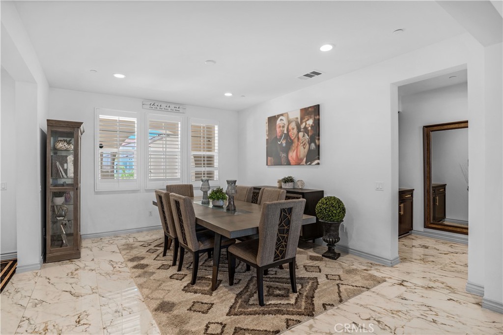 17195 Compass Drive Riverside, CA 92503 - Photo 12 of 75 a view of a dining room with furniture