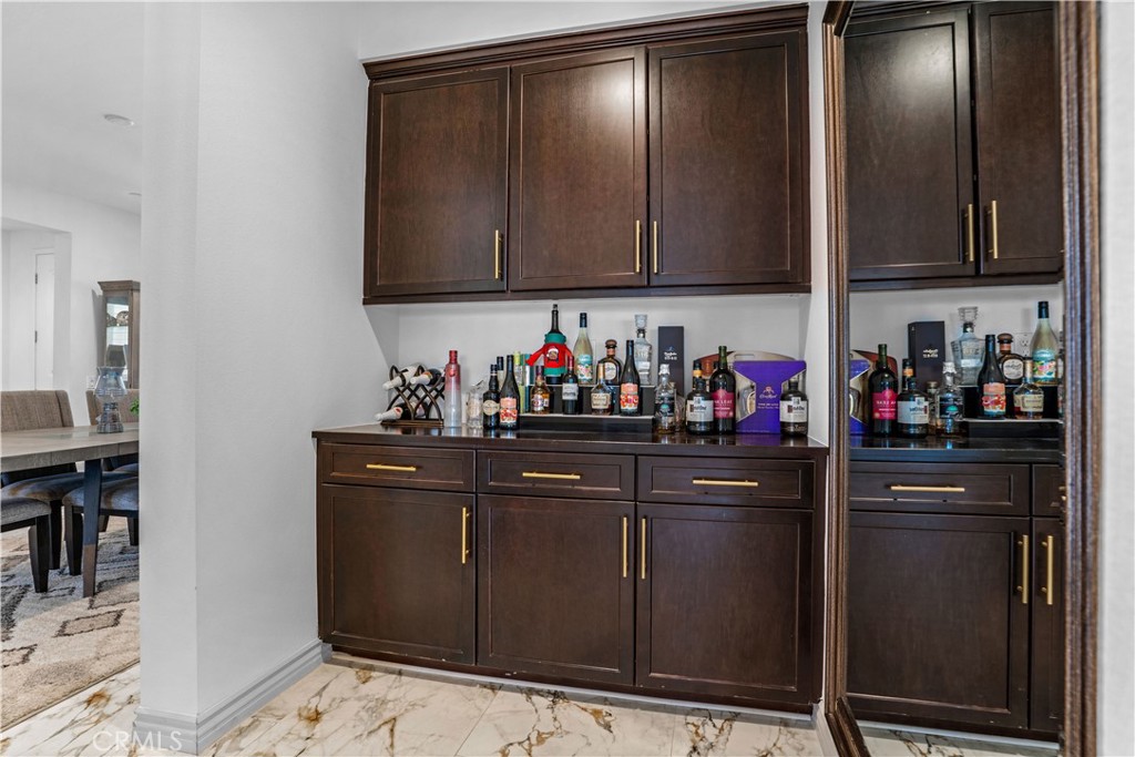 17195 Compass Drive Riverside, CA 92503 - Photo 13 of 75 a kitchen with stainless steel appliances granite countertop a refrigerator and a sink