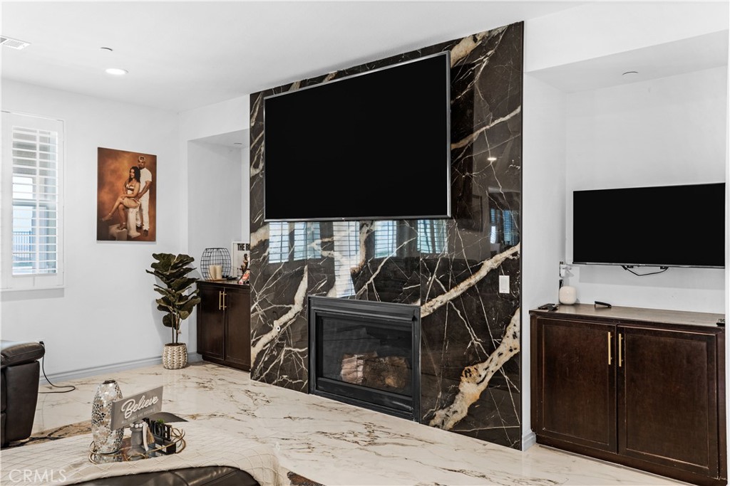 17195 Compass Drive Riverside, CA 92503 - Photo 16 of 75 a room with furniture and flat screen tv