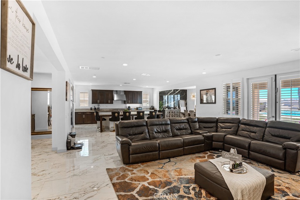 17195 Compass Drive Riverside, CA 92503 - Photo 17 of 75 a living room with furniture and a large window
