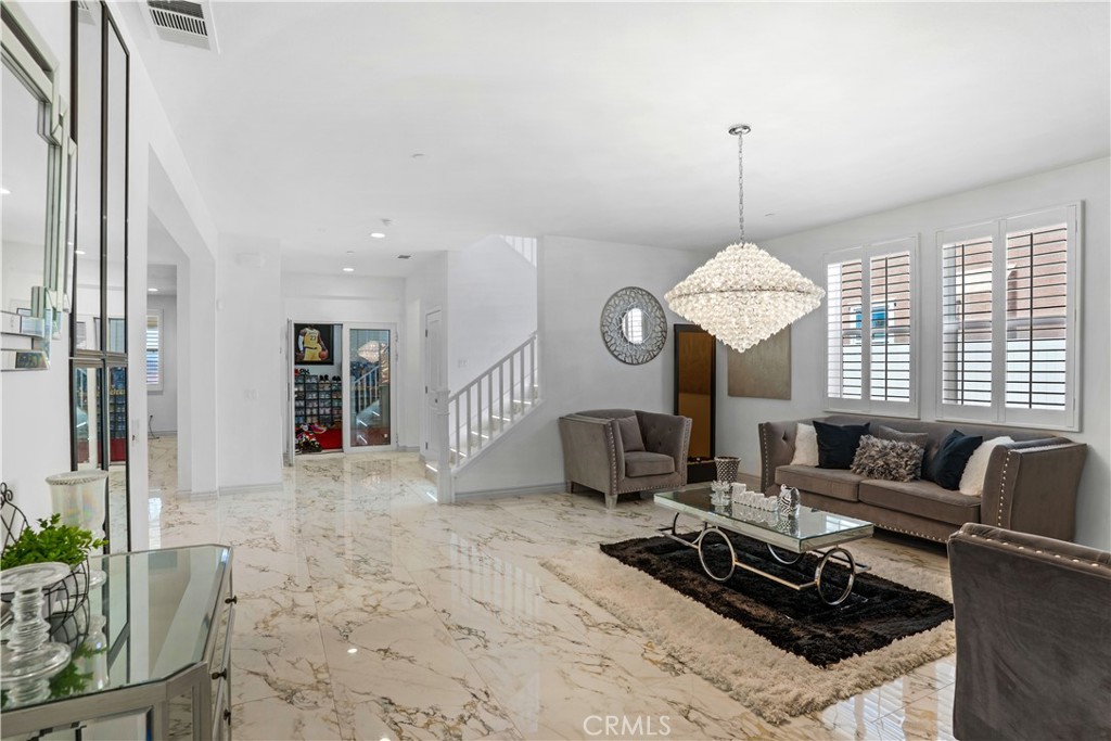 17195 Compass Drive Riverside, CA 92503 - Photo 28 of 75 a view of a livingroom with furniture window and wooden floor