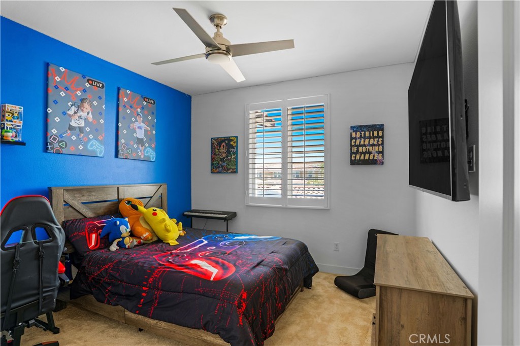 17195 Compass Drive Riverside, CA 92503 - Photo 48 of 75 a bedroom with bed and a window