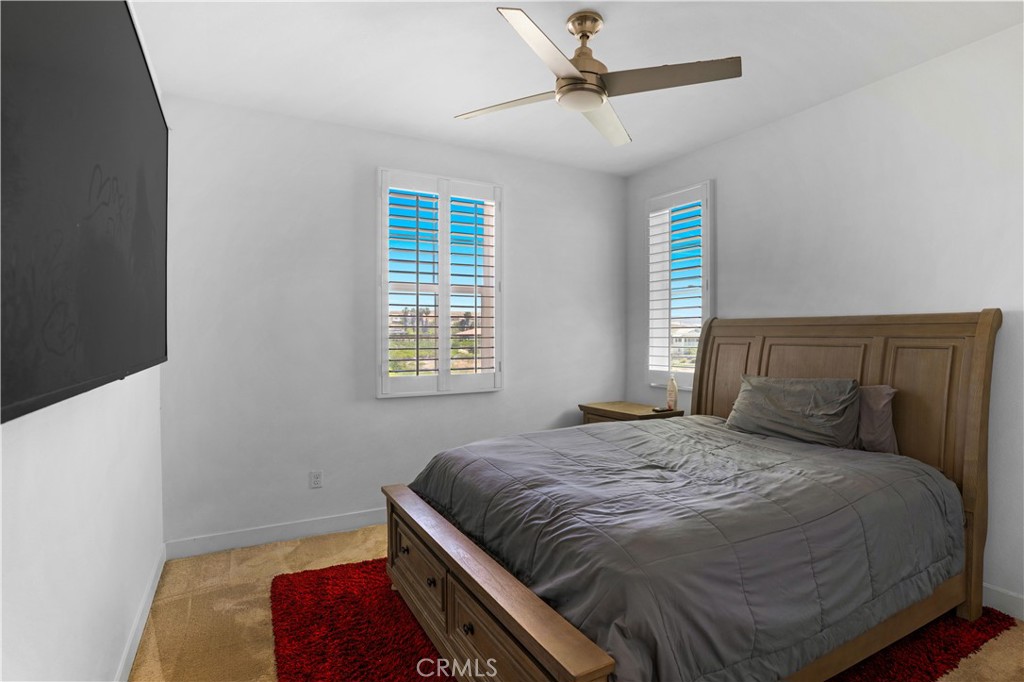 17195 Compass Drive Riverside, CA 92503 - Photo 58 of 75 a bedroom with a bed and window