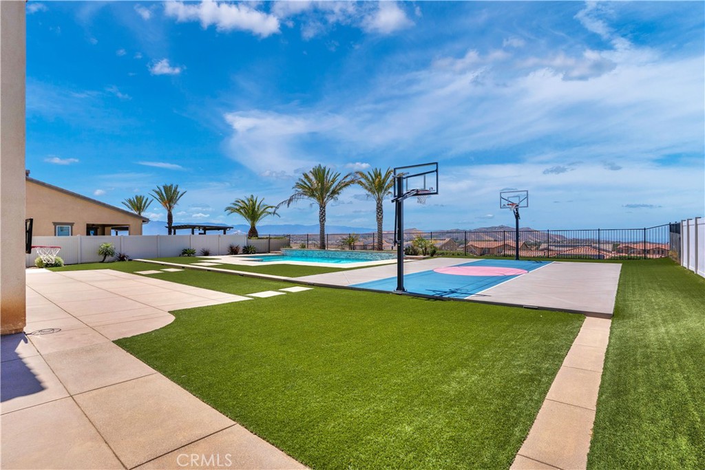 17195 Compass Drive Riverside, CA 92503 - Photo 63 of 75 a view of a swimming pool with an outdoor seating