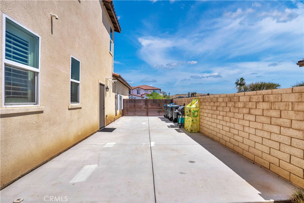 17195 Compass Drive Riverside, CA 92503 - Photo 70 of 75 a view of a pathway along a building