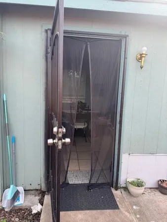 a kitchen with a sink and a stove top oven