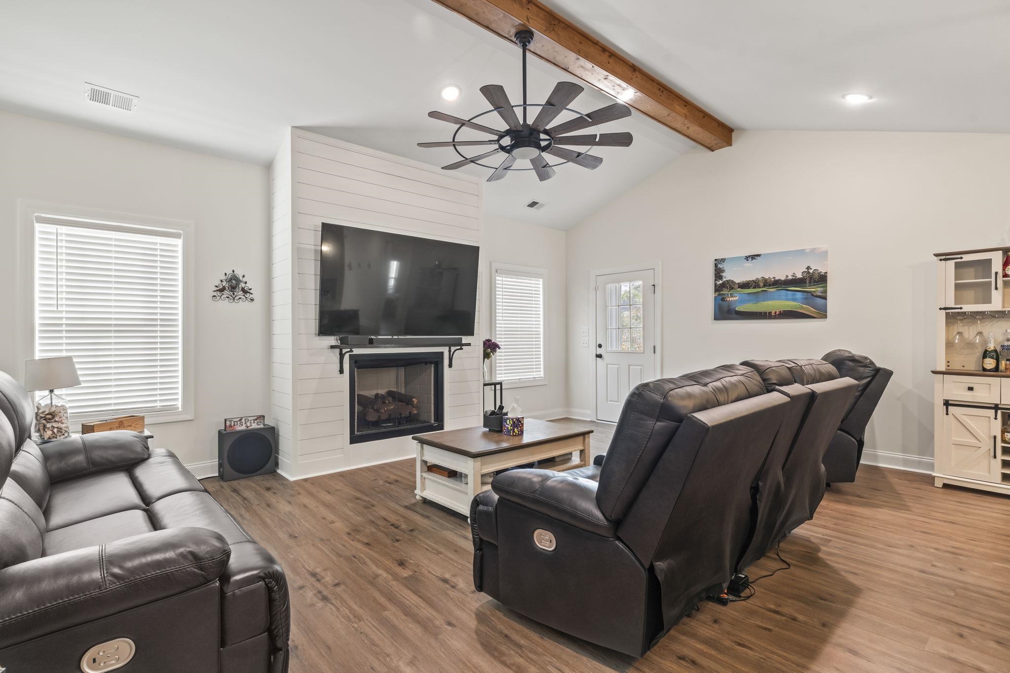 207 Putney Court Conway, SC 29526 - Photo 15 of 38 Living room featuring ceiling fan, wood finished floors, and a large fireplace
