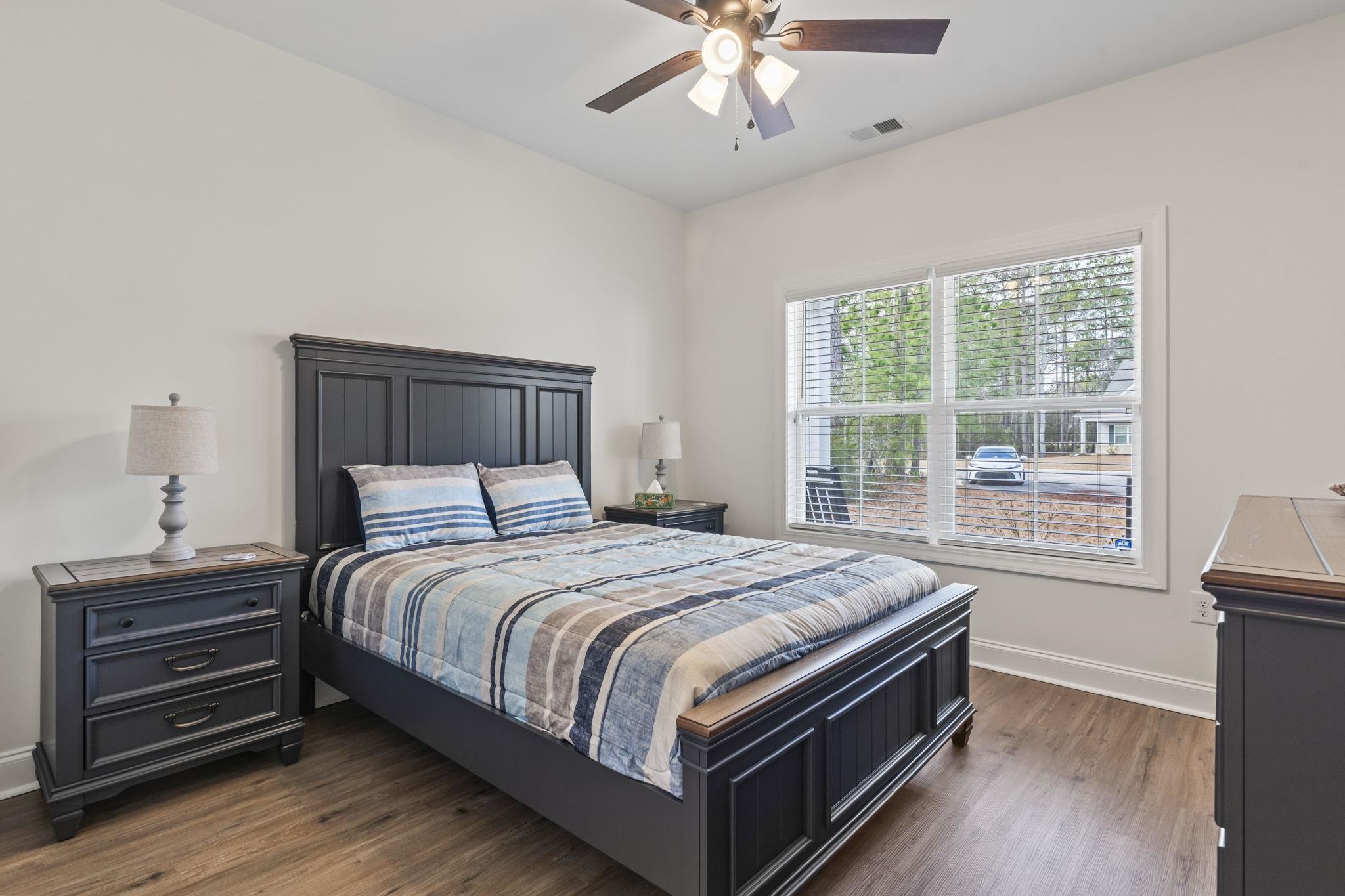 207 Putney Court Conway, SC 29526 - Photo 21 of 38 Bedroom featuring dark wood finished floors and ceiling fan