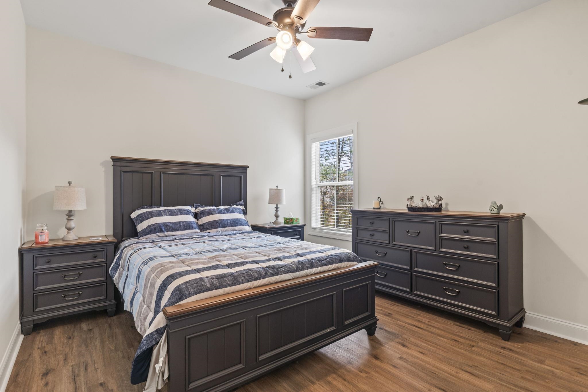 207 Putney Court Conway, SC 29526 - Photo 23 of 38 Bedroom with a ceiling fan and dark wood-type flooring