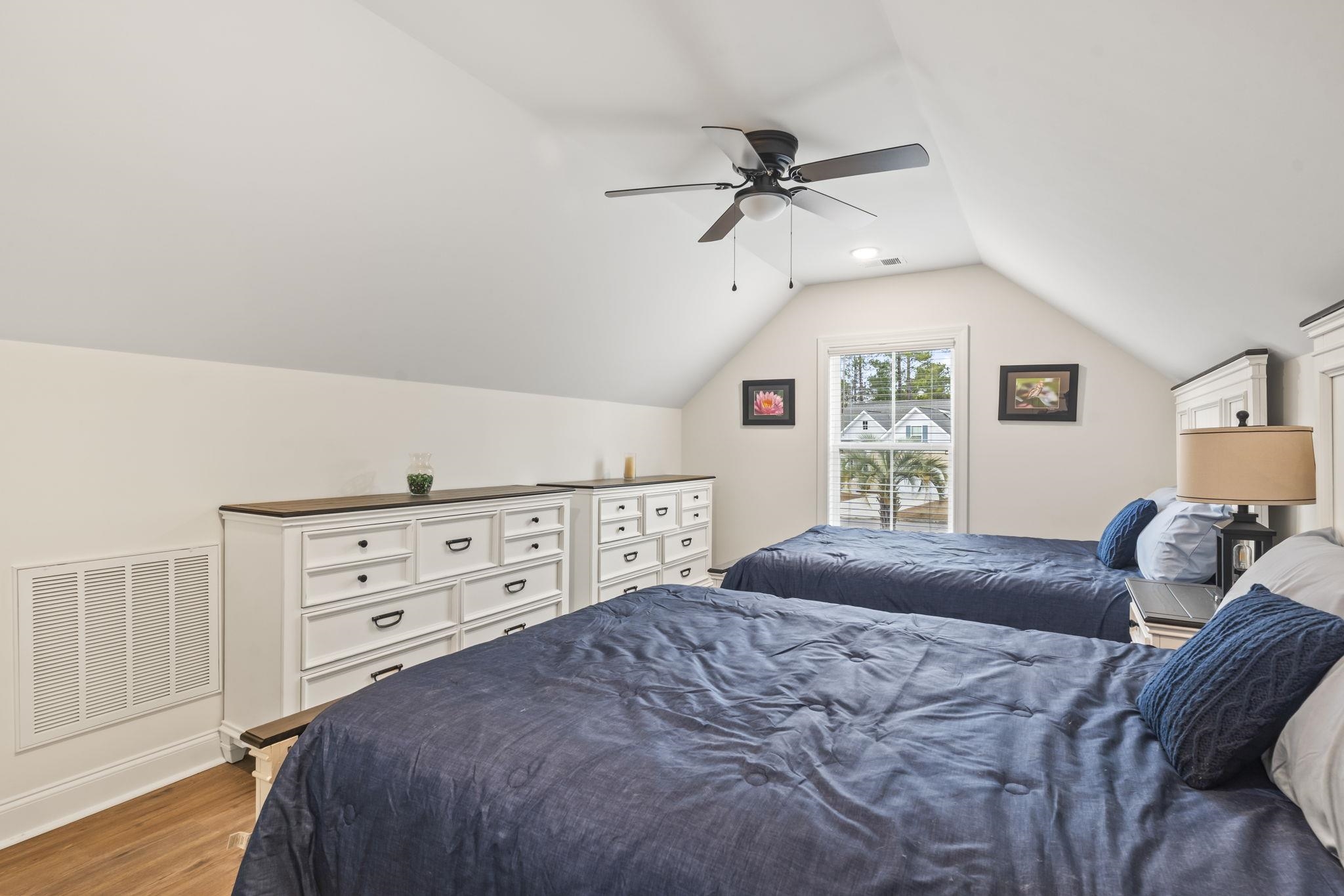 207 Putney Court Conway, SC 29526 - Photo 24 of 38 Bedroom with wood finished floors, vaulted ceiling, and a ceiling fan