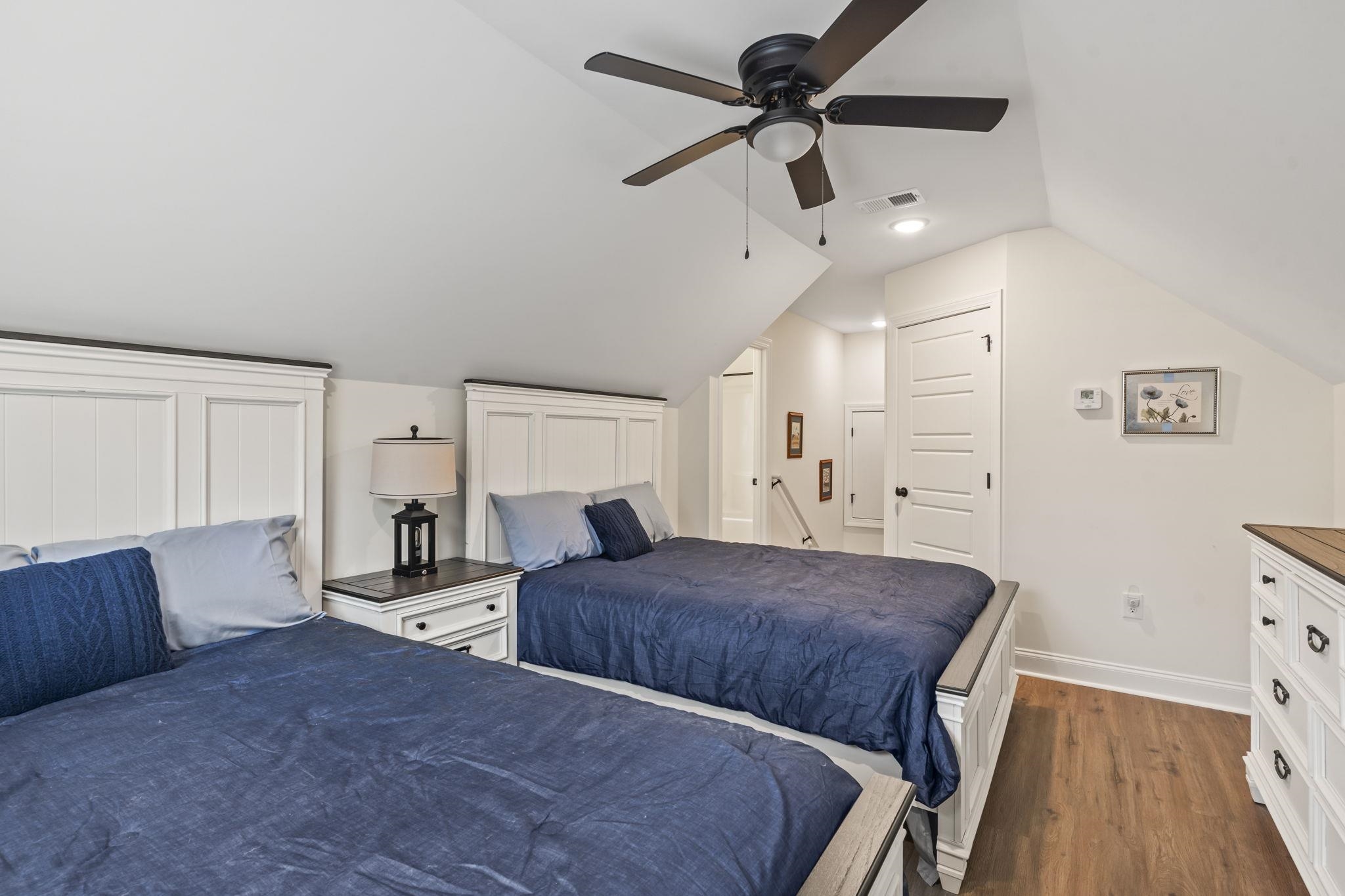 207 Putney Court Conway, SC 29526 - Photo 25 of 38 Bedroom with lofted ceiling, dark wood-style floors, and a ceiling fan