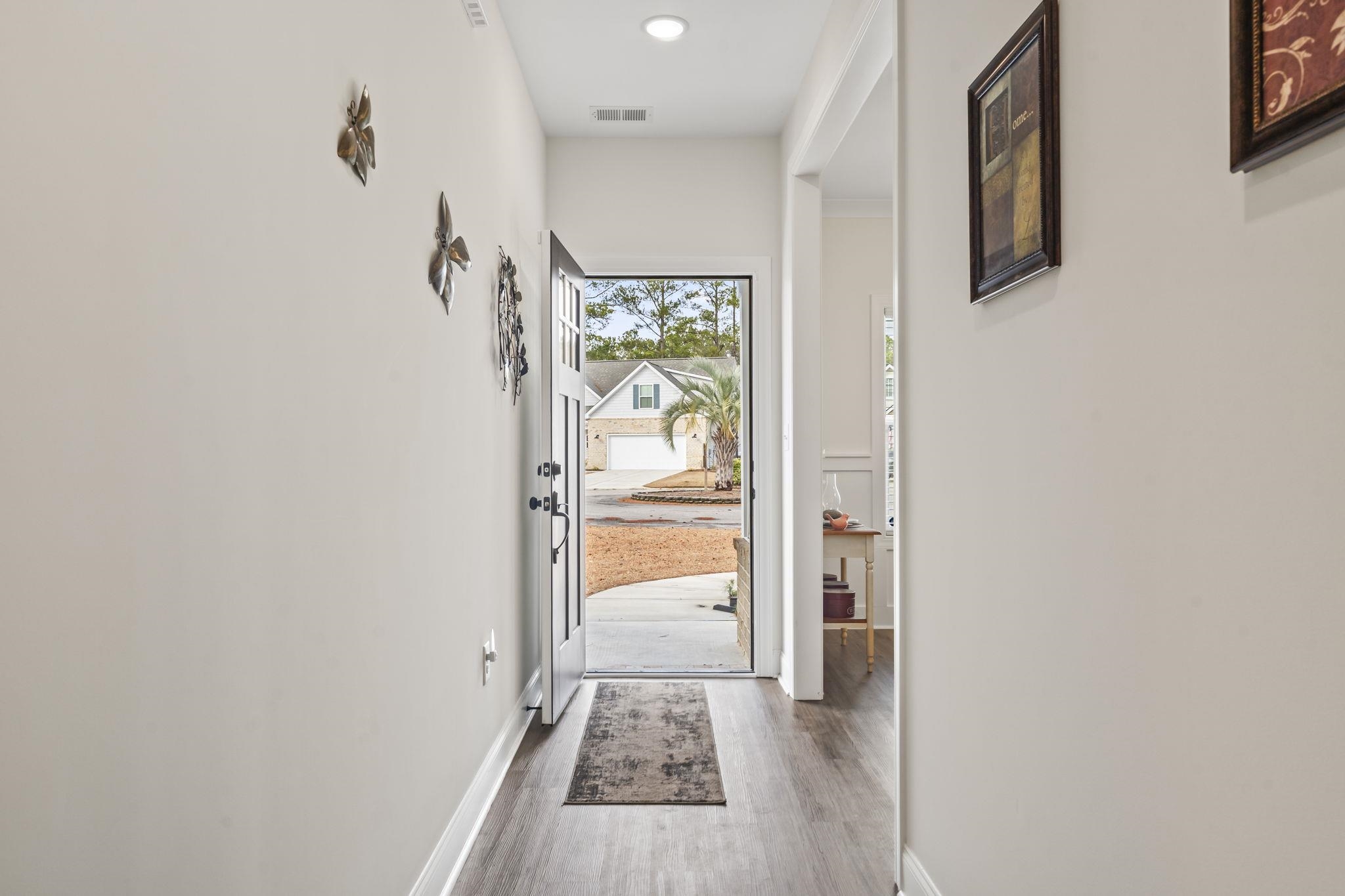 207 Putney Court Conway, SC 29526 - Photo 5 of 38 Entryway with recessed lighting and wood finished floors