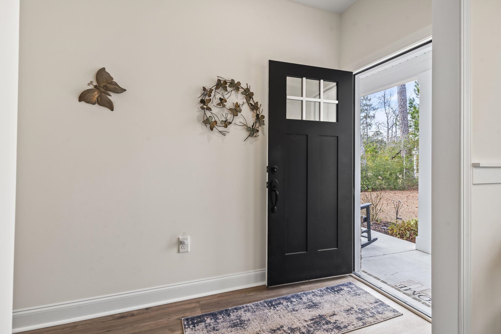 207 Putney Court Conway, SC 29526 - Photo 6 of 38 Entryway with baseboards and wood finished floors